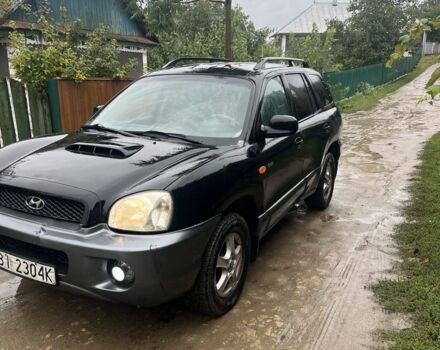 Чорний Хендай Санта Фе, об'ємом двигуна 2 л та пробігом 271 тис. км за 3400 $, фото 1 на Automoto.ua