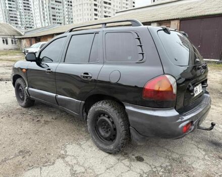 Черный Хендай Санта Фе, объемом двигателя 2 л и пробегом 278 тыс. км за 2500 $, фото 2 на Automoto.ua