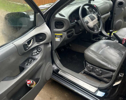 Черный Хендай Санта Фе, объемом двигателя 2 л и пробегом 271 тыс. км за 4000 $, фото 13 на Automoto.ua