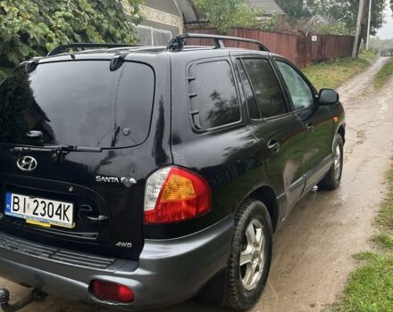 Чорний Хендай Санта Фе, об'ємом двигуна 2 л та пробігом 271 тис. км за 3400 $, фото 5 на Automoto.ua