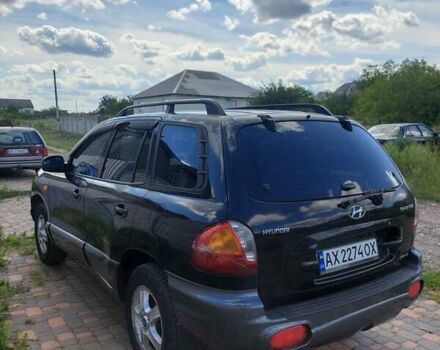 Чорний Хендай Санта Фе, об'ємом двигуна 2.66 л та пробігом 320 тис. км за 4800 $, фото 1 на Automoto.ua