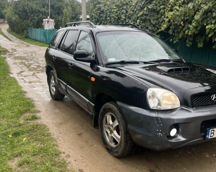 Чорний Хендай Санта Фе, об'ємом двигуна 2 л та пробігом 271 тис. км за 3400 $, фото 2 на Automoto.ua