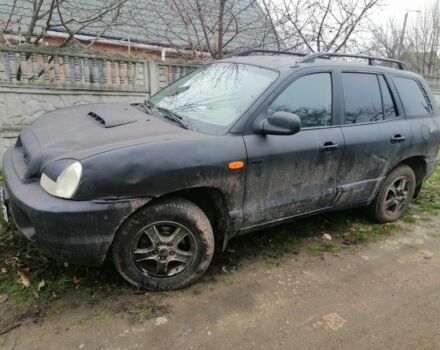 Черный Хендай Санта Фе, объемом двигателя 2 л и пробегом 220 тыс. км за 2700 $, фото 3 на Automoto.ua