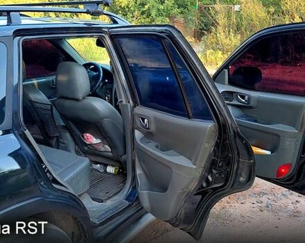 Черный Хендай Санта Фе, объемом двигателя 2 л и пробегом 388 тыс. км за 4000 $, фото 2 на Automoto.ua