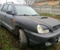 Черный Хендай Санта Фе, объемом двигателя 2 л и пробегом 220 тыс. км за 2700 $, фото 2 на Automoto.ua