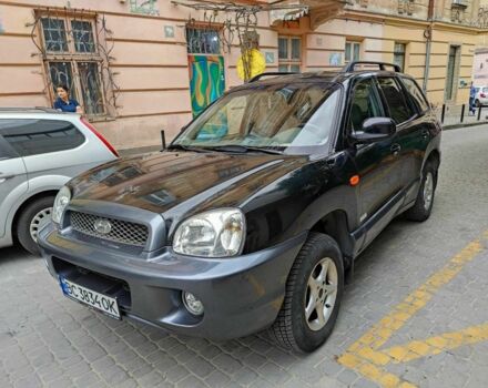 Черный Хендай Санта Фе, объемом двигателя 2.4 л и пробегом 240 тыс. км за 4400 $, фото 1 на Automoto.ua