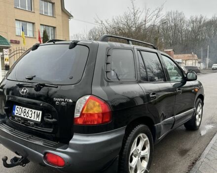 Чорний Хендай Санта Фе, об'ємом двигуна 2 л та пробігом 300 тис. км за 2700 $, фото 2 на Automoto.ua