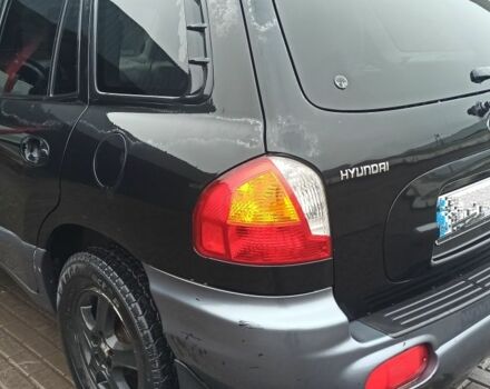 Чорний Хендай Санта Фе, об'ємом двигуна 2 л та пробігом 345 тис. км за 2700 $, фото 4 на Automoto.ua