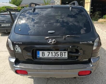 Чорний Хендай Санта Фе, об'ємом двигуна 2 л та пробігом 285 тис. км за 3200 $, фото 4 на Automoto.ua
