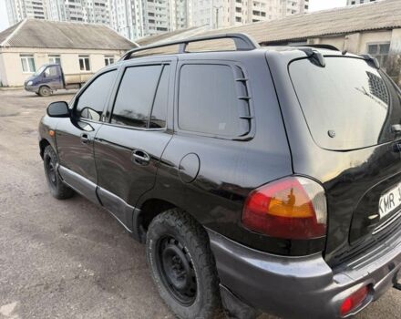 Черный Хендай Санта Фе, объемом двигателя 2 л и пробегом 266 тыс. км за 3200 $, фото 1 на Automoto.ua