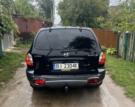 Чорний Хендай Санта Фе, об'ємом двигуна 2 л та пробігом 271 тис. км за 3400 $, фото 4 на Automoto.ua