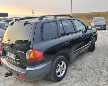 Черный Хендай Санта Фе, объемом двигателя 2.4 л и пробегом 240 тыс. км за 4400 $, фото 9 на Automoto.ua