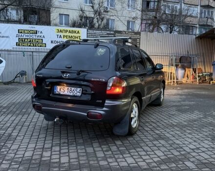 Черный Хендай Санта Фе, объемом двигателя 2 л и пробегом 340 тыс. км за 3500 $, фото 2 на Automoto.ua