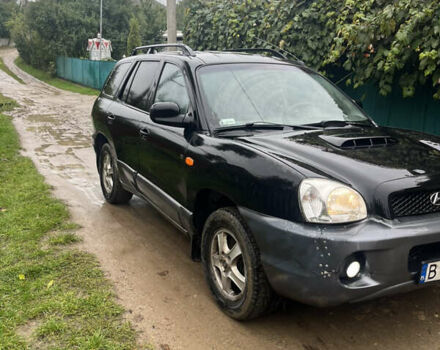 Черный Хендай Санта Фе, объемом двигателя 2 л и пробегом 271 тыс. км за 4000 $, фото 2 на Automoto.ua