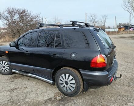 Черный Хендай Санта Фе, объемом двигателя 2 л и пробегом 360 тыс. км за 3699 $, фото 2 на Automoto.ua