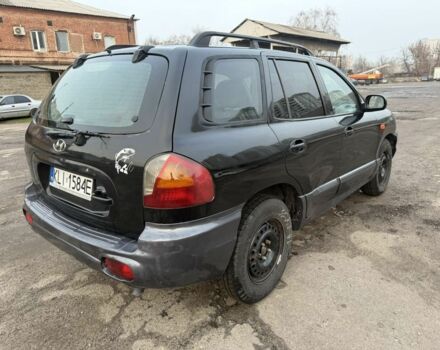 Черный Хендай Санта Фе, объемом двигателя 2 л и пробегом 283 тыс. км за 3300 $, фото 1 на Automoto.ua
