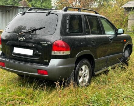 Черный Хендай Санта Фе, объемом двигателя 2 л и пробегом 273 тыс. км за 3500 $, фото 3 на Automoto.ua