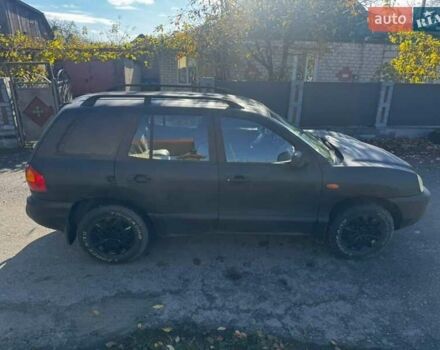 Чорний Хендай Санта Фе, об'ємом двигуна 2 л та пробігом 385 тис. км за 3000 $, фото 1 на Automoto.ua