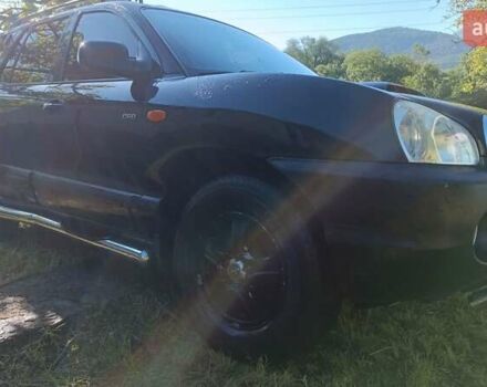 Чорний Хендай Санта Фе, об'ємом двигуна 1.99 л та пробігом 318 тис. км за 7000 $, фото 4 на Automoto.ua