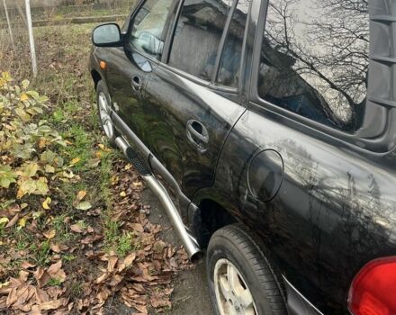 Черный Хендай Санта Фе, объемом двигателя 2.4 л и пробегом 240 тыс. км за 1900 $, фото 7 на Automoto.ua