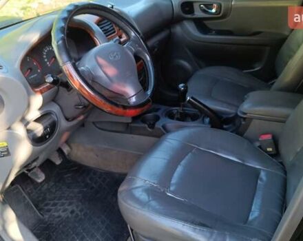 Чорний Хендай Санта Фе, об'ємом двигуна 1.99 л та пробігом 318 тис. км за 7000 $, фото 5 на Automoto.ua