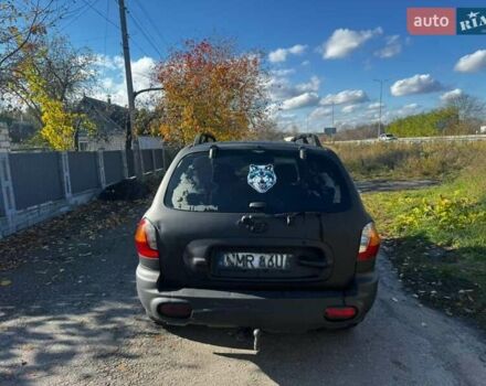 Чорний Хендай Санта Фе, об'ємом двигуна 2 л та пробігом 385 тис. км за 3000 $, фото 3 на Automoto.ua