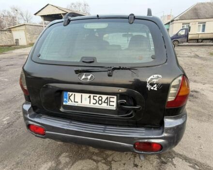 Черный Хендай Санта Фе, объемом двигателя 2 л и пробегом 283 тыс. км за 3300 $, фото 4 на Automoto.ua