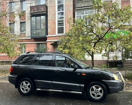 Черный Хендай Санта Фе, объемом двигателя 2 л и пробегом 323 тыс. км за 4268 $, фото 1 на Automoto.ua