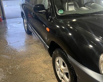 Чорний Хендай Санта Фе, об'ємом двигуна 2 л та пробігом 383 тис. км за 3300 $, фото 3 на Automoto.ua