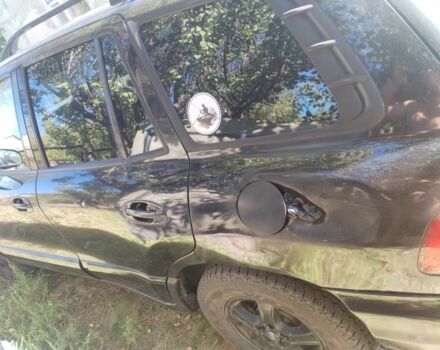 Черный Хендай Санта Фе, объемом двигателя 2.4 л и пробегом 295 тыс. км за 3100 $, фото 1 на Automoto.ua