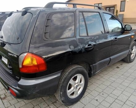 Черный Хендай Санта Фе, объемом двигателя 2.2 л и пробегом 330 тыс. км за 3844 $, фото 4 на Automoto.ua