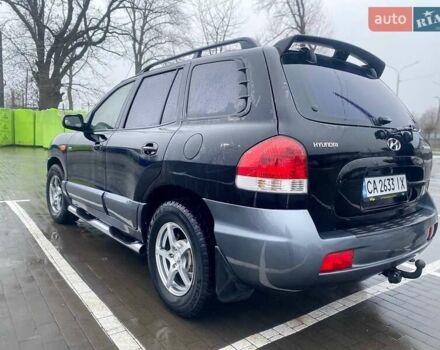 Чорний Хендай Санта Фе, об'ємом двигуна 1.99 л та пробігом 360 тис. км за 6400 $, фото 7 на Automoto.ua