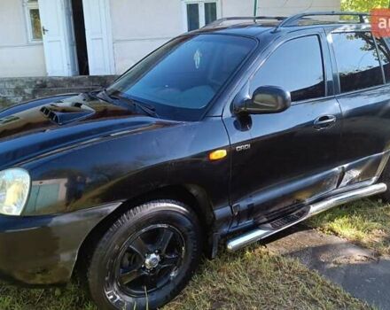 Чорний Хендай Санта Фе, об'ємом двигуна 1.99 л та пробігом 318 тис. км за 7000 $, фото 1 на Automoto.ua