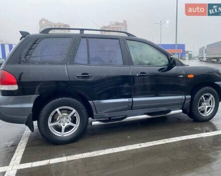 Чорний Хендай Санта Фе, об'ємом двигуна 1.99 л та пробігом 360 тис. км за 6400 $, фото 4 на Automoto.ua