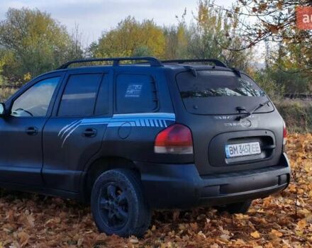 Чорний Хендай Санта Фе, об'ємом двигуна 2 л та пробігом 306 тис. км за 4199 $, фото 9 на Automoto.ua