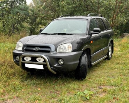 Черный Хендай Санта Фе, объемом двигателя 2 л и пробегом 273 тыс. км за 3500 $, фото 1 на Automoto.ua