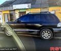 Чорний Хендай Санта Фе, об'ємом двигуна 2 л та пробігом 320 тис. км за 4700 $, фото 1 на Automoto.ua
