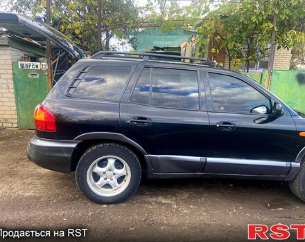 Черный Хендай Санта Фе, объемом двигателя 2 л и пробегом 350 тыс. км за 4200 $, фото 3 на Automoto.ua