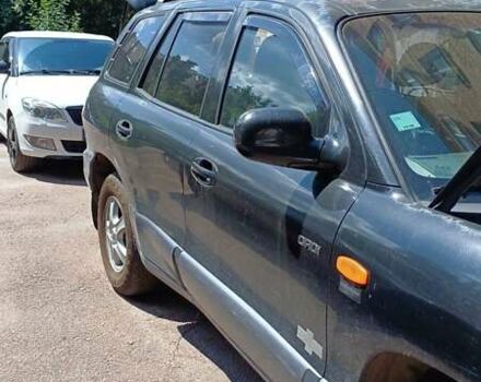 Черный Хендай Санта Фе, объемом двигателя 2.2 л и пробегом 230 тыс. км за 4800 $, фото 2 на Automoto.ua