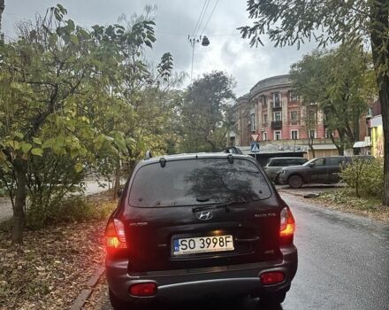 Черный Хендай Санта Фе, объемом двигателя 2 л и пробегом 323 тыс. км за 4268 $, фото 2 на Automoto.ua