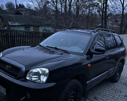 Чорний Хендай Санта Фе, об'ємом двигуна 2.35 л та пробігом 189 тис. км за 6499 $, фото 1 на Automoto.ua