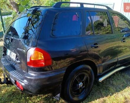 Чорний Хендай Санта Фе, об'ємом двигуна 1.99 л та пробігом 318 тис. км за 7000 $, фото 3 на Automoto.ua