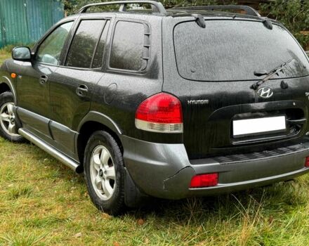 Черный Хендай Санта Фе, объемом двигателя 2 л и пробегом 273 тыс. км за 3500 $, фото 2 на Automoto.ua