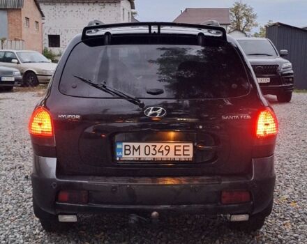 Хендай Санта Фе 2004 в Кропивницком (Кировограде) на Automoto.ua Черный Хендай Санта Фе, объемом двигателя 2 л и пробегом 240 тыс. км за 5450 $, фото 4 на Automoto.ua