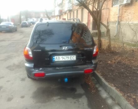 Черный Хендай Санта Фе, объемом двигателя 2 л и пробегом 28 тыс. км за 5500 $, фото 2 на Automoto.ua