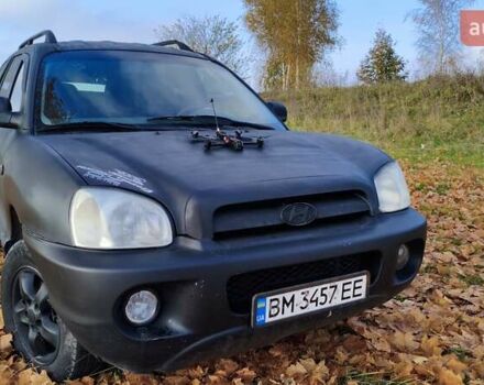 Чорний Хендай Санта Фе, об'ємом двигуна 2 л та пробігом 306 тис. км за 4199 $, фото 4 на Automoto.ua