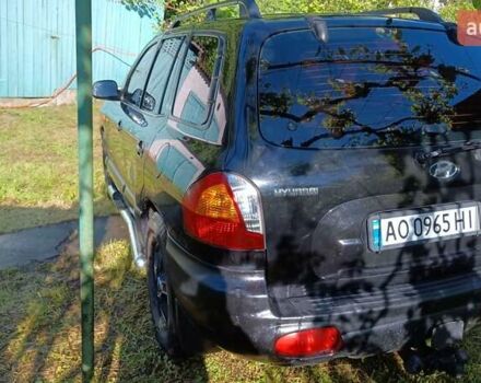 Чорний Хендай Санта Фе, об'ємом двигуна 1.99 л та пробігом 318 тис. км за 7000 $, фото 2 на Automoto.ua