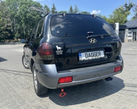 Черный Хендай Санта Фе, объемом двигателя 2.4 л и пробегом 297 тыс. км за 5700 $, фото 4 на Automoto.ua