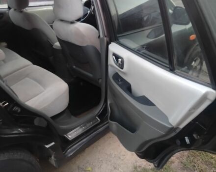 Черный Хендай Санта Фе, объемом двигателя 2 л и пробегом 272 тыс. км за 3900 $, фото 13 на Automoto.ua