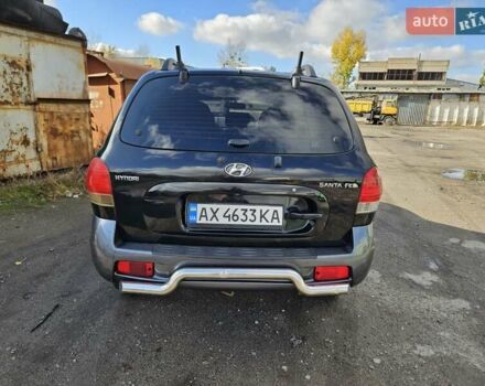 Черный Хендай Санта Фе, объемом двигателя 2 л и пробегом 225 тыс. км за 5850 $, фото 13 на Automoto.ua